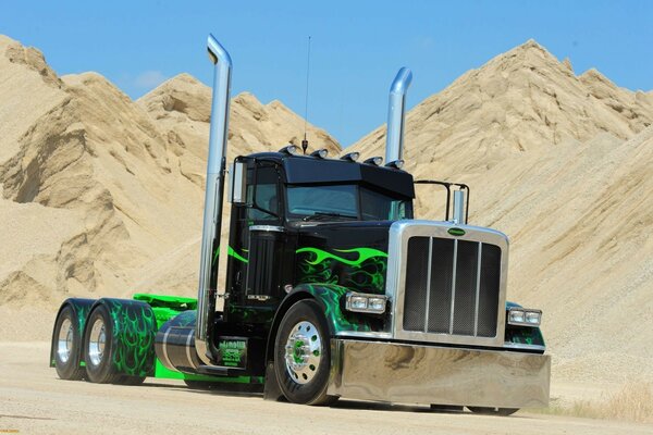 The transport system of the truck on the sand