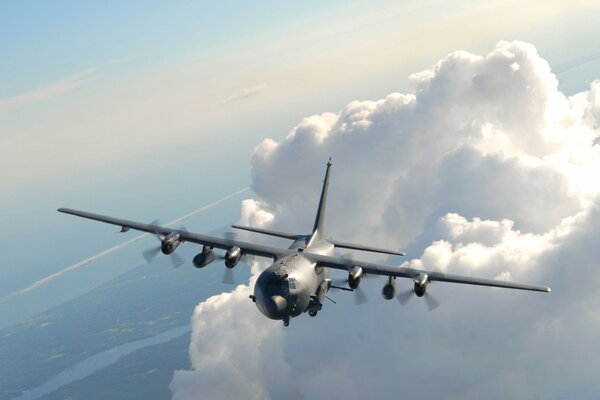 Flying fighter plane in the clouds