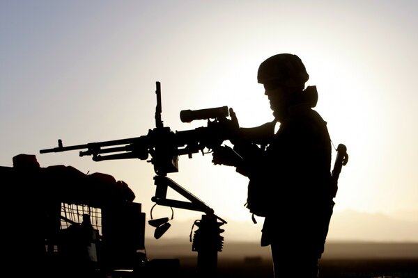 Outline of a soldier against the sky