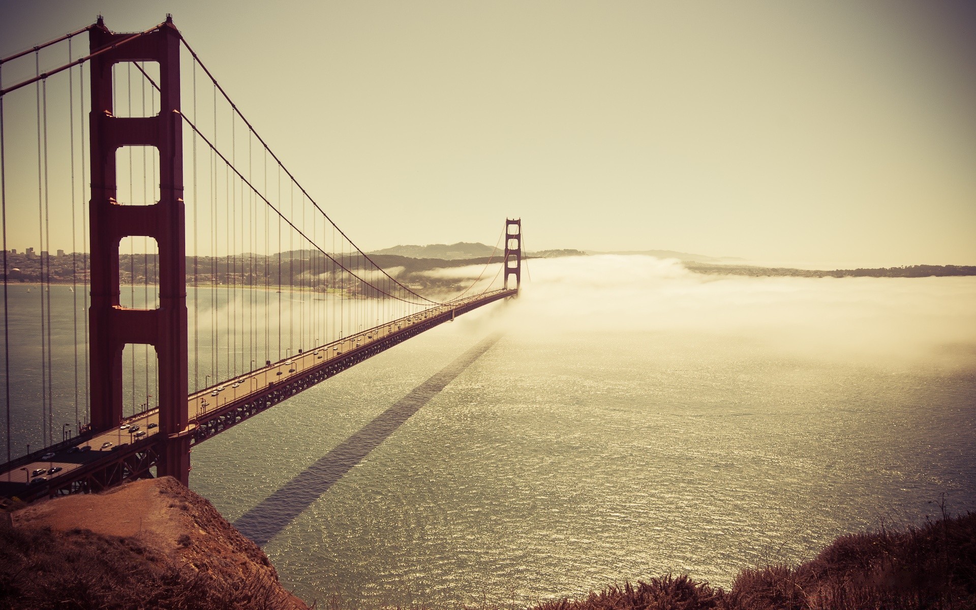 vintage water bridge sea sunset dawn ocean beach seashore transportation system landscape suspension bridge light travel reflection vehicle evening river sky bay