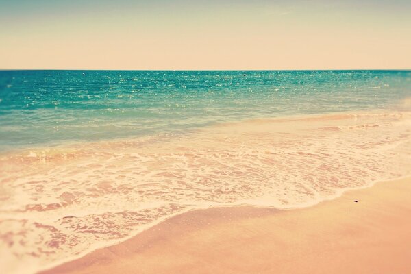 The tide of the sea on a tropical beach