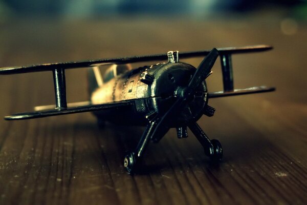 Small vintage airplane figurine