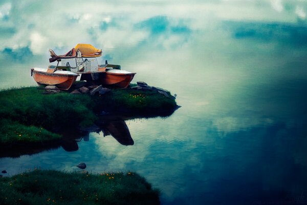 A boat on the edge of the sky and water