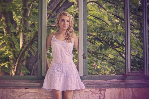 A lonely girl in an abandoned house