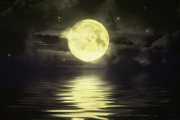 The yellow moon is reflected in the water