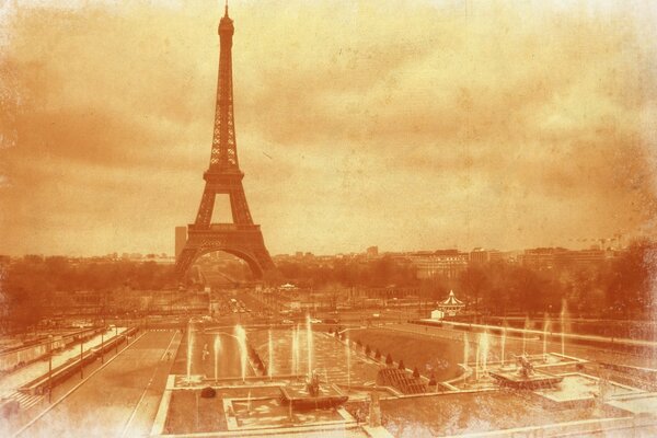 A tower in Paris and beautiful fountains and ships