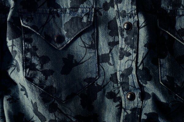 Flowers on the pocket of a denim jacket