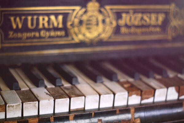 Vintage piano with shabby keys