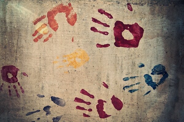 Bright hand prints on the wall