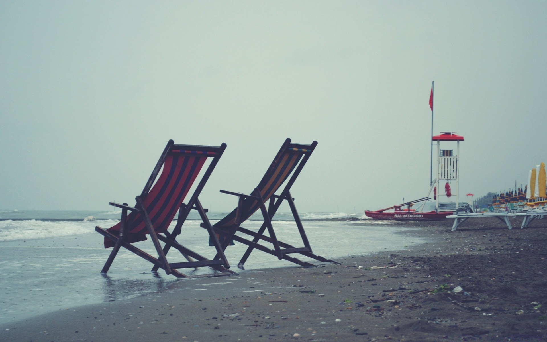 vintage beach chair sea ocean water seashore travel sand vacation sun leisure umbrella sunset relaxation summer resort island recreation seascape