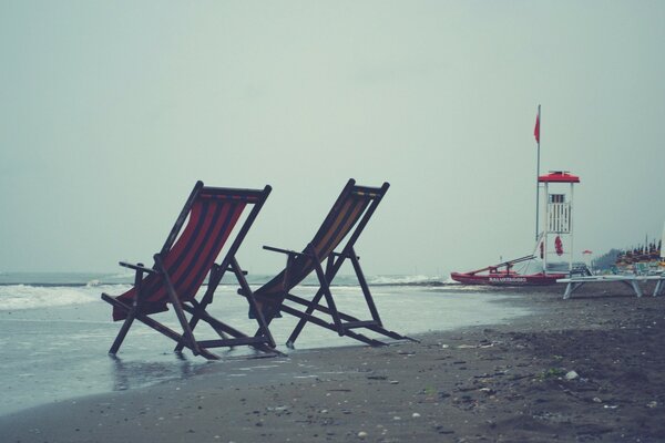 Two sun beds on the beach