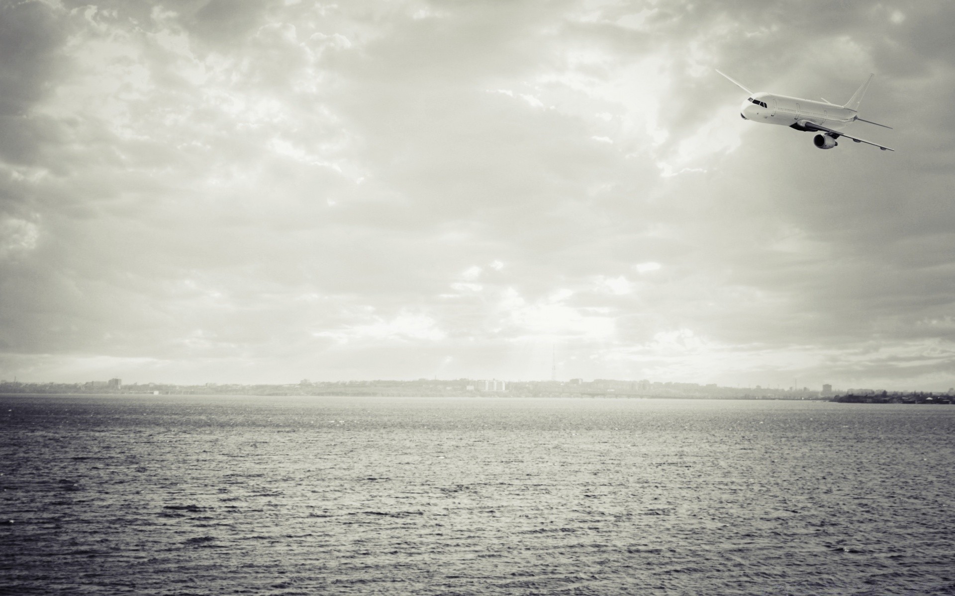 vintage airplane water aircraft sea vehicle transportation system beach sky ocean monochrome landscape seashore