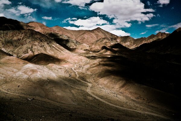 White clouds floating over the mountains