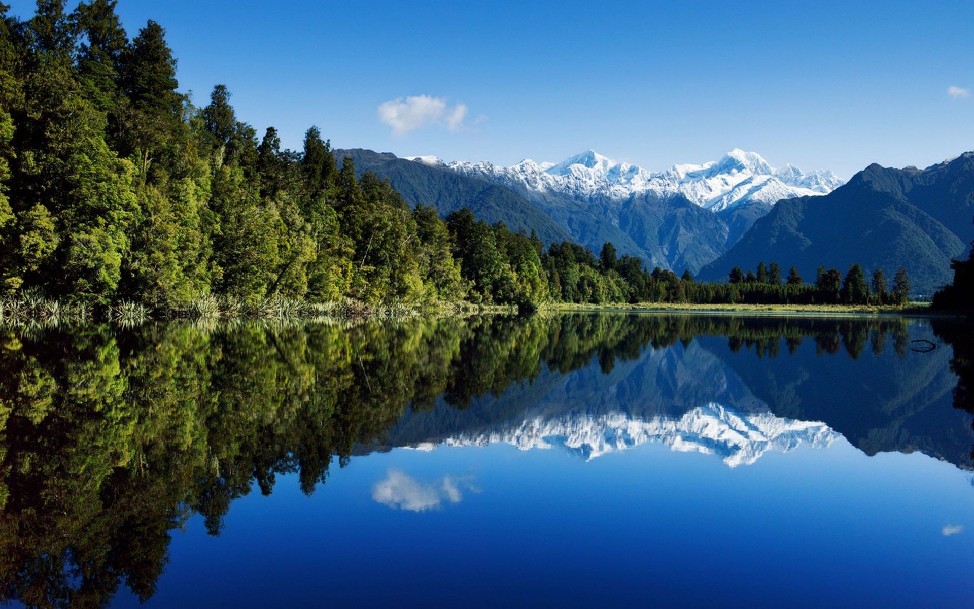 lake water reflection mountain landscape wood scenic tree nature outdoors travel snow evergreen valley conifer river sky daylight