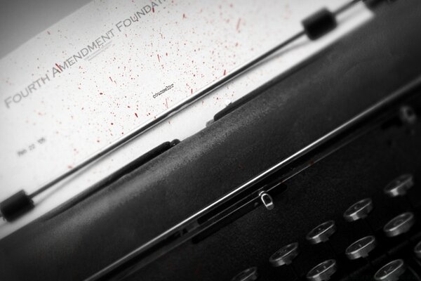 The typewriter is black