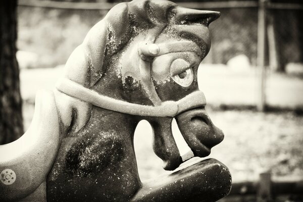 An old vintage attraction with a horse