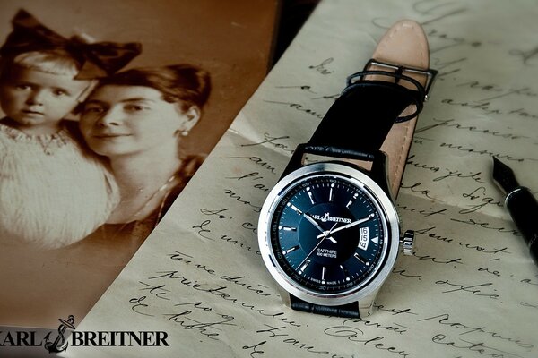 Vintage composition of watches, letters and photos