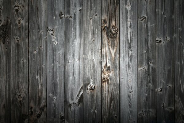 A wall made of old black wood