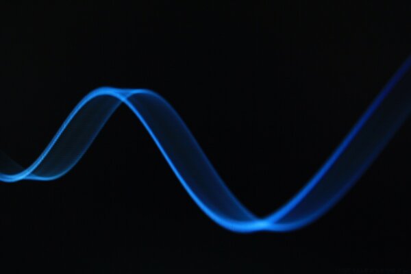 Blue blurred stripe on a black background