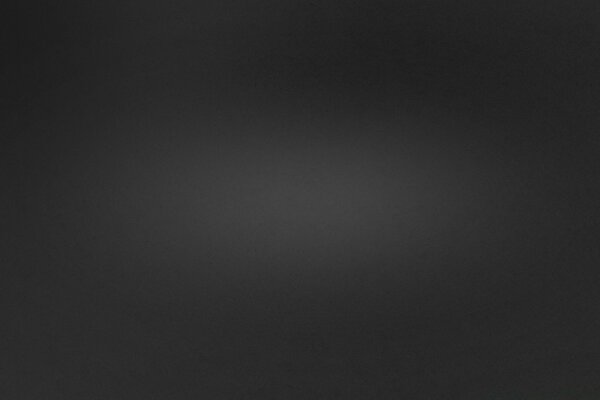 Black desktop with glare