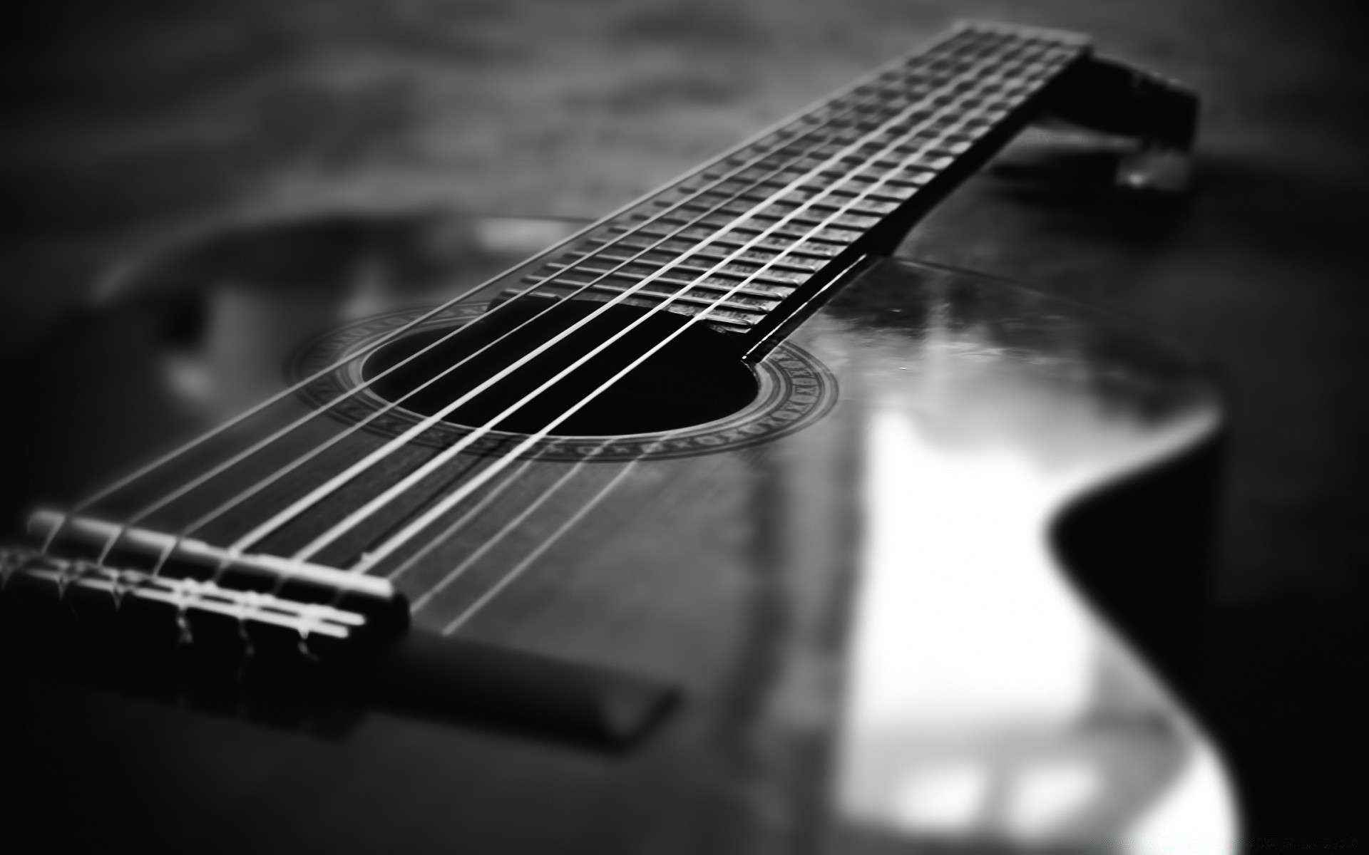 blanco y negro guitarra instrumento acústico música sonido instrumento de cuerda de arco jazz clásico monocromo canción músico madera acorde jugar fret diapasón guitarra acústica hardware