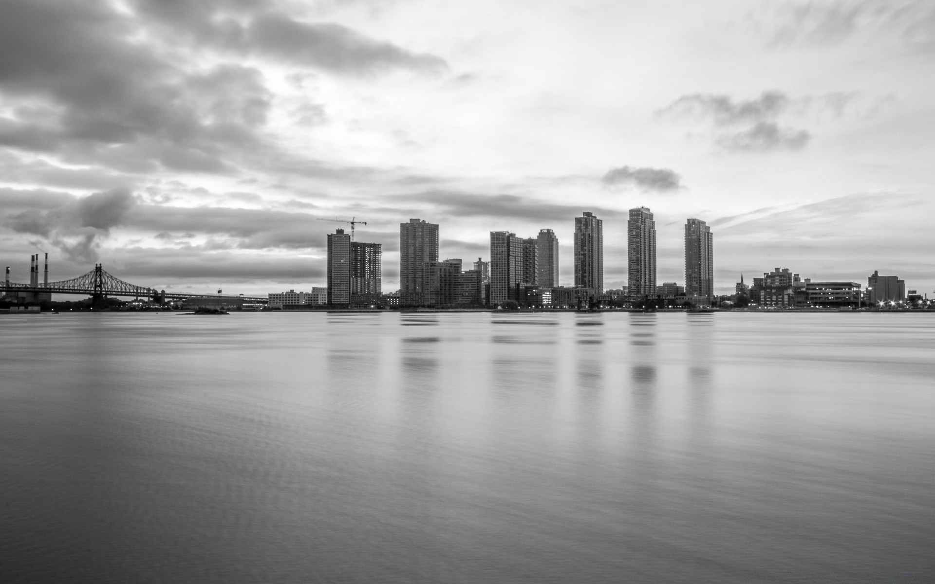 black and white city water skyline architecture river reflection cityscape sunset travel downtown sky skyscraper building dawn waterfront monochrome bridge pier