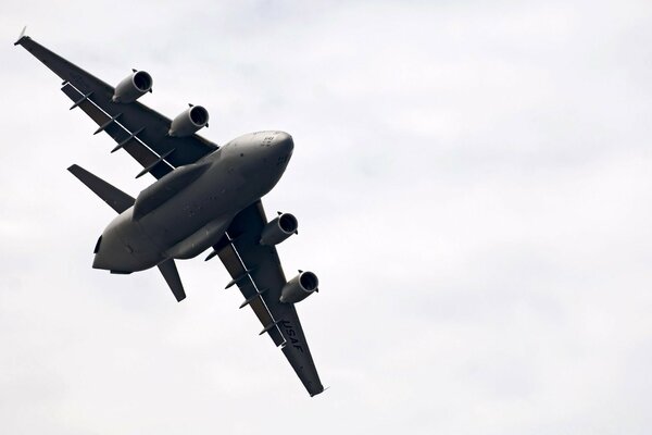 Military aircraft piloting in the sky