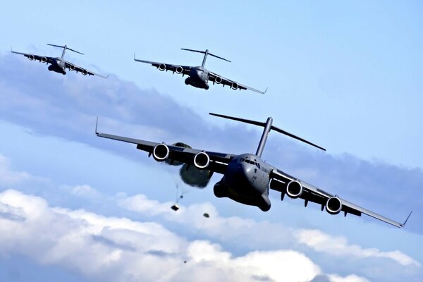 Three planes in the clouds