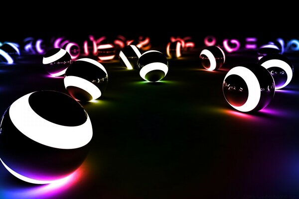 Glowing balls on a black background