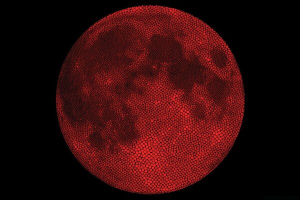 The disk of the blood-red moon in the dark