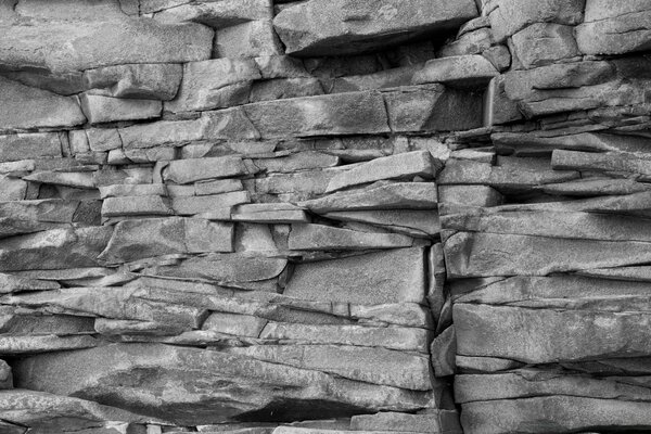 Pared texturizada de piedra. Piedra vieja. Fondo de Escritorio