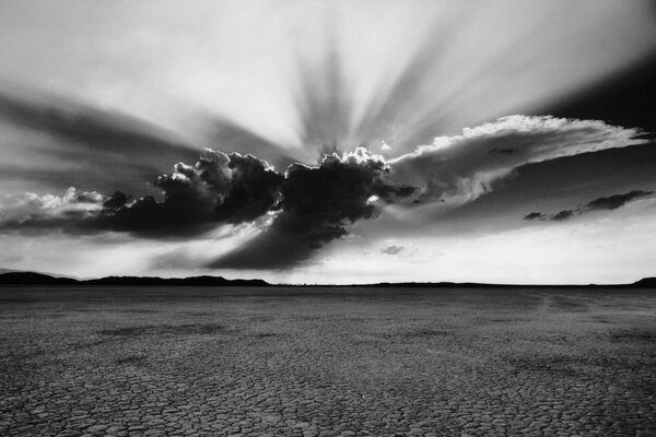 Black and white background clouds over the field