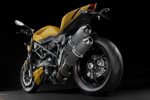 Yellow motorcycle with black wheels