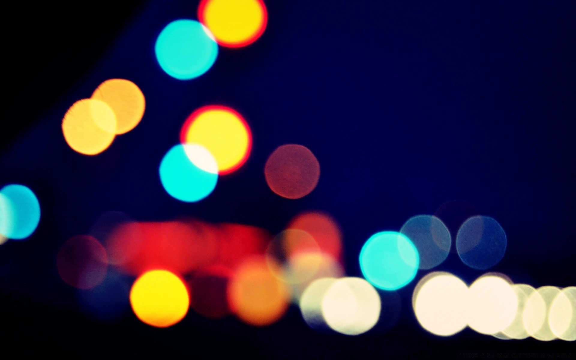 bokeh borrão brilhante natal retroiluminado luz redondo abstrato design brilha luminescência cor desktop férias pouco foco escuro