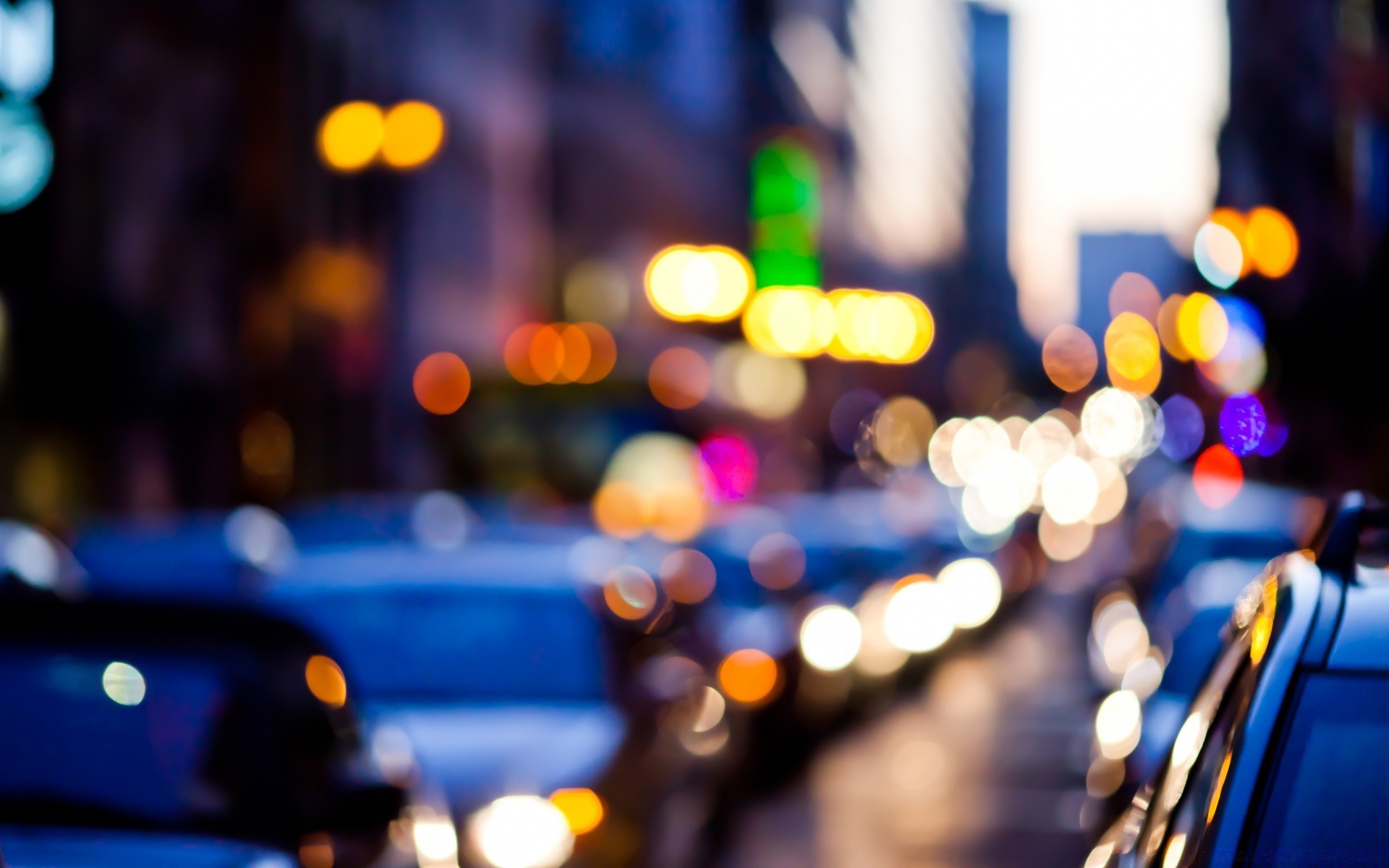 bokeh flou vie nocturne rue noël mise au point partie ville couleur voiture rétro-éclairé vacances dof