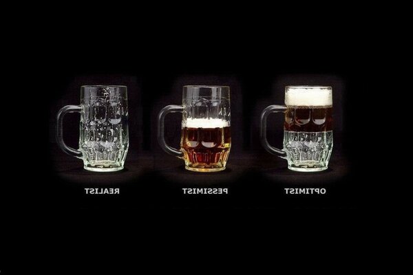 Three beers on a black background