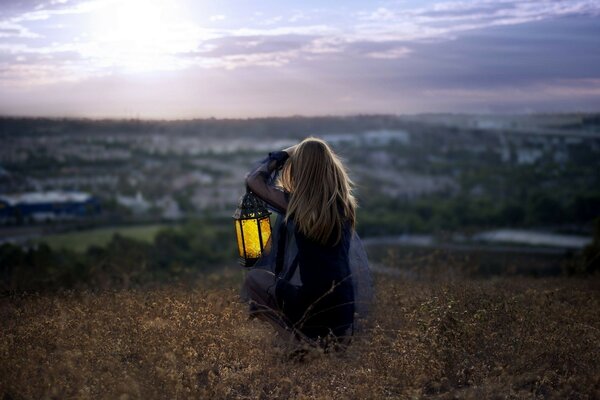 Fille avec une lanterne photographie paysage