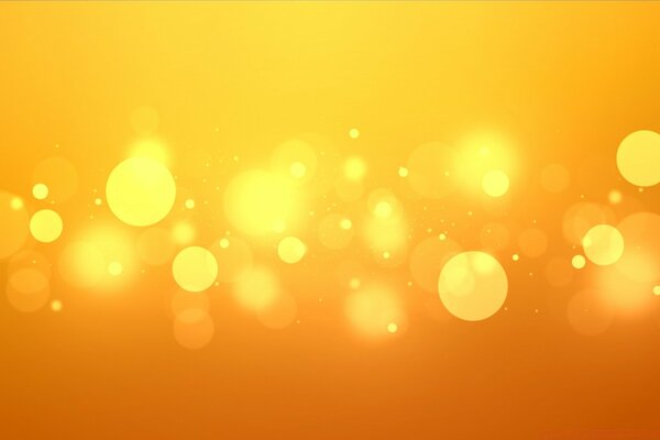 Yellow-orange background with circles of different diameters