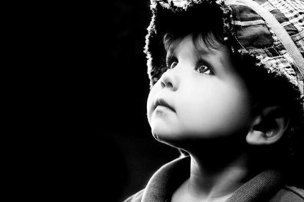 Black and white portrait of a little boy