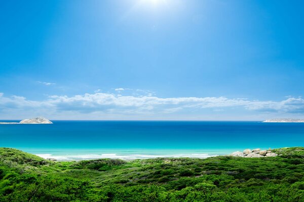 A picturesque seashore with a bright blue sea