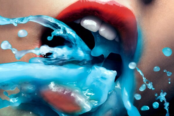 Scarlet lips in blue water