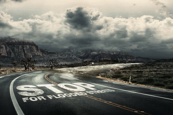 Photo of the road for a marathon or for racing away mountains and clouds