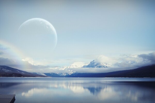 Quiet surface of the lake, landscape against the background of mountains