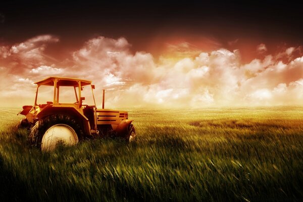 Photo d un tracteur dans un champ sur un fond de ciel nuageux au coucher du soleil