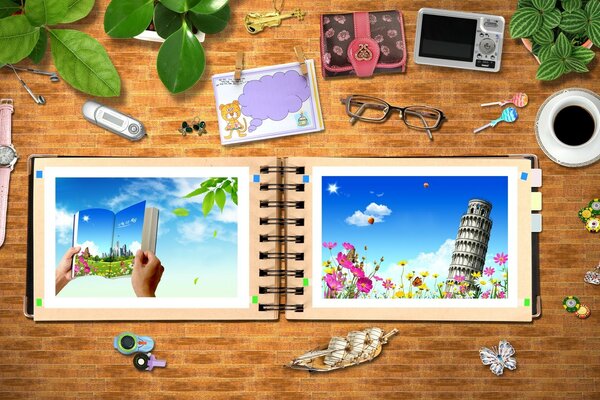 An open notebook with pictures among the office and various things on the table