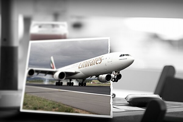 Emirates plane at the airfield runway