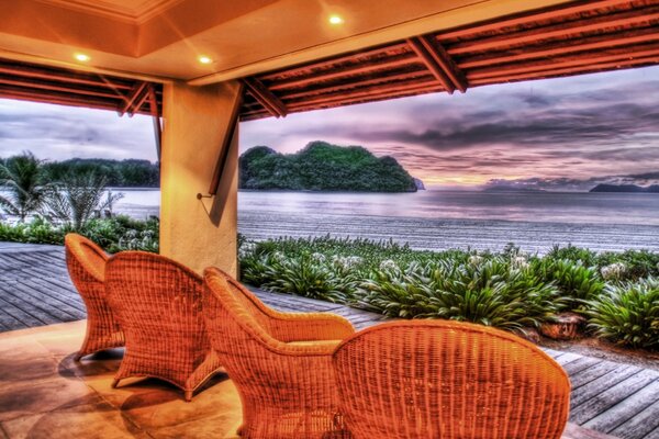 Wicker chairs of the resort. Relaxation