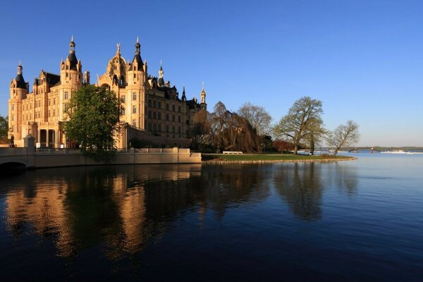 Beautiful castle on the river bank