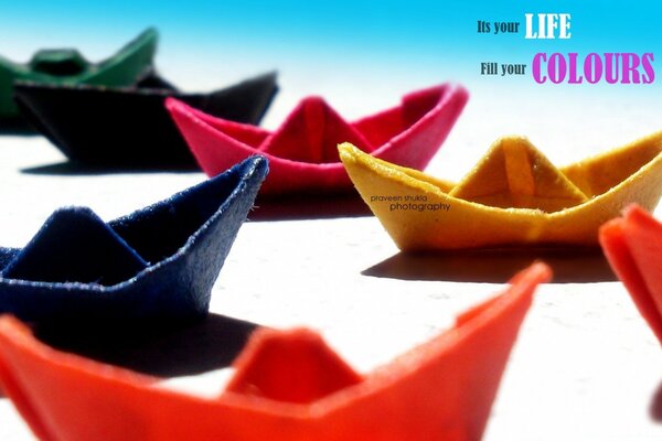 Colorful boats on a white background