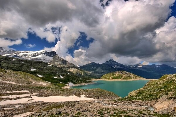 Berge Steine Bucht Fuß Schnee Wolken